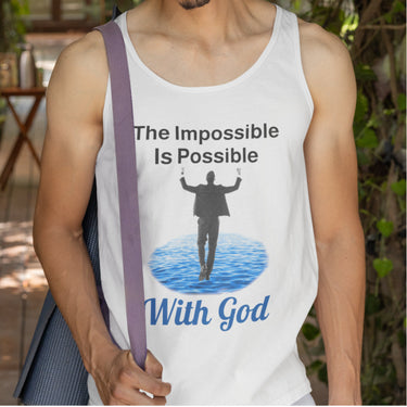 Lightweight Bella+Canvas tank top made from preshrunk cotton with “Impossible Man” design message, “The Impossible Is Possible with God,” inspirational apparel calling believers to step out in faith and walk with God into new possibilities, man in white tank top